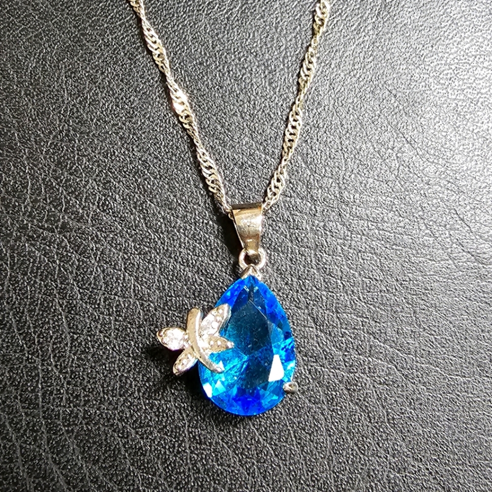 Sterling Silver pendant with Blue Topez Stone